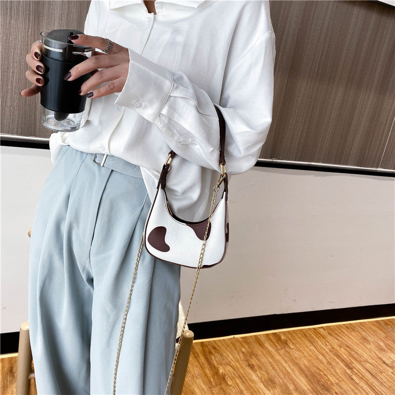 Underarm carry messenger bag