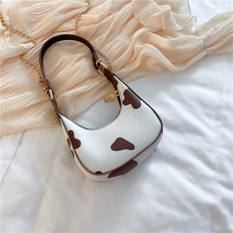 Underarm carry messenger bag